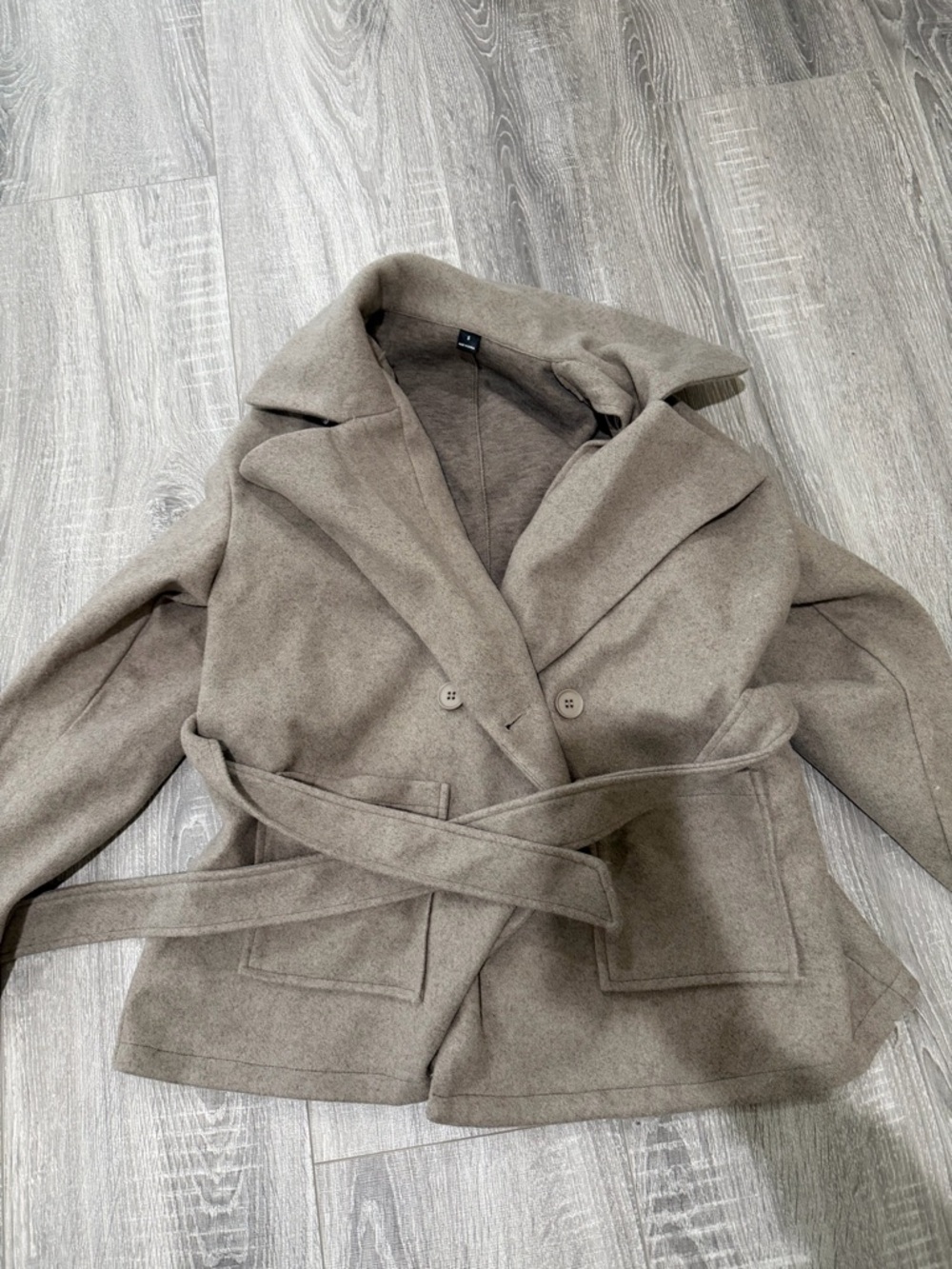 taupe peacoat with tie